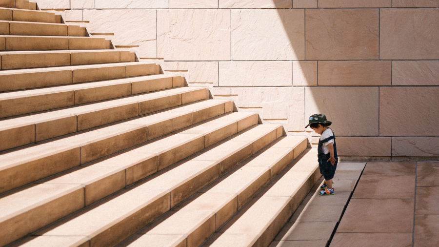 child-looking-stairs